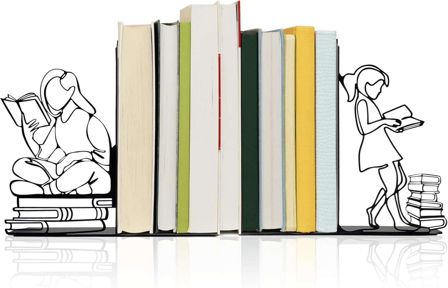 A pair of black metal decorative bookends, each shaped like the silhouette of a person reading while leaning against a stack of books.