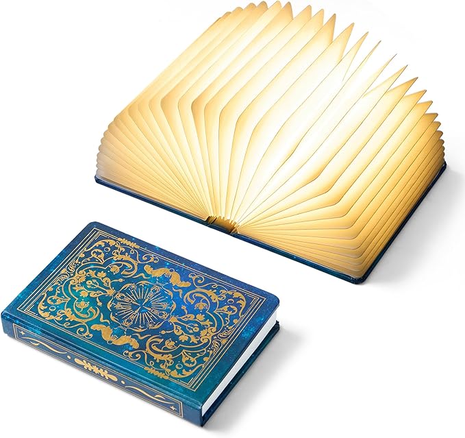A foldable lamp shaped like a book that opens to emit a warm glow.